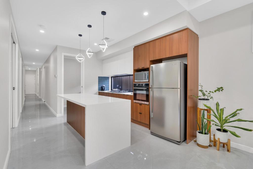 Modern kitchen in Lavish on Leeds, a Luxe-managed holiday home in Adelaide CBD, Adelaide