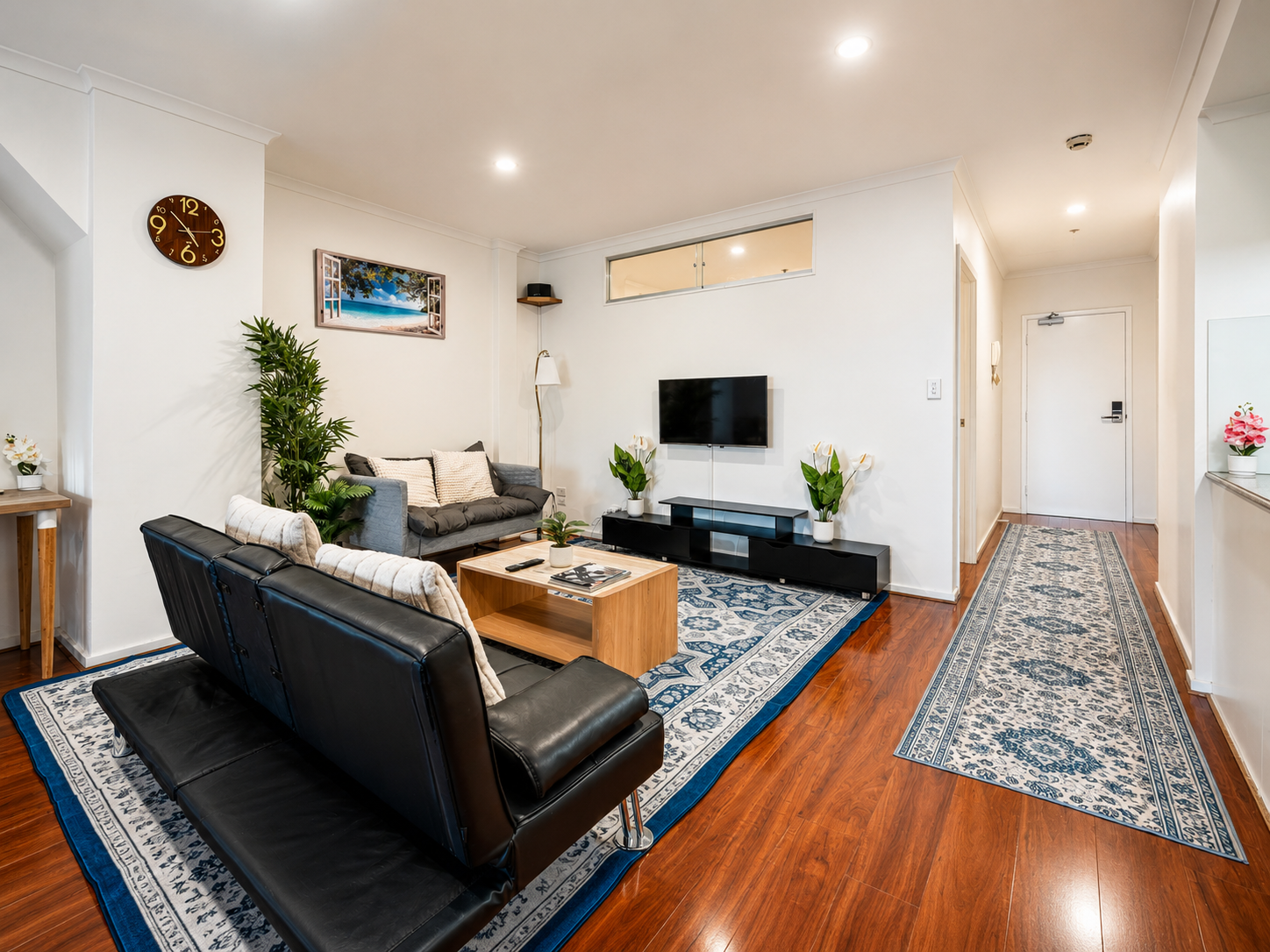 Renovated open-plan living area of Relaxation at Rundle Mall, a Luxe-managed Adelaide Airbnb in Adelaide CBD, Adelaide