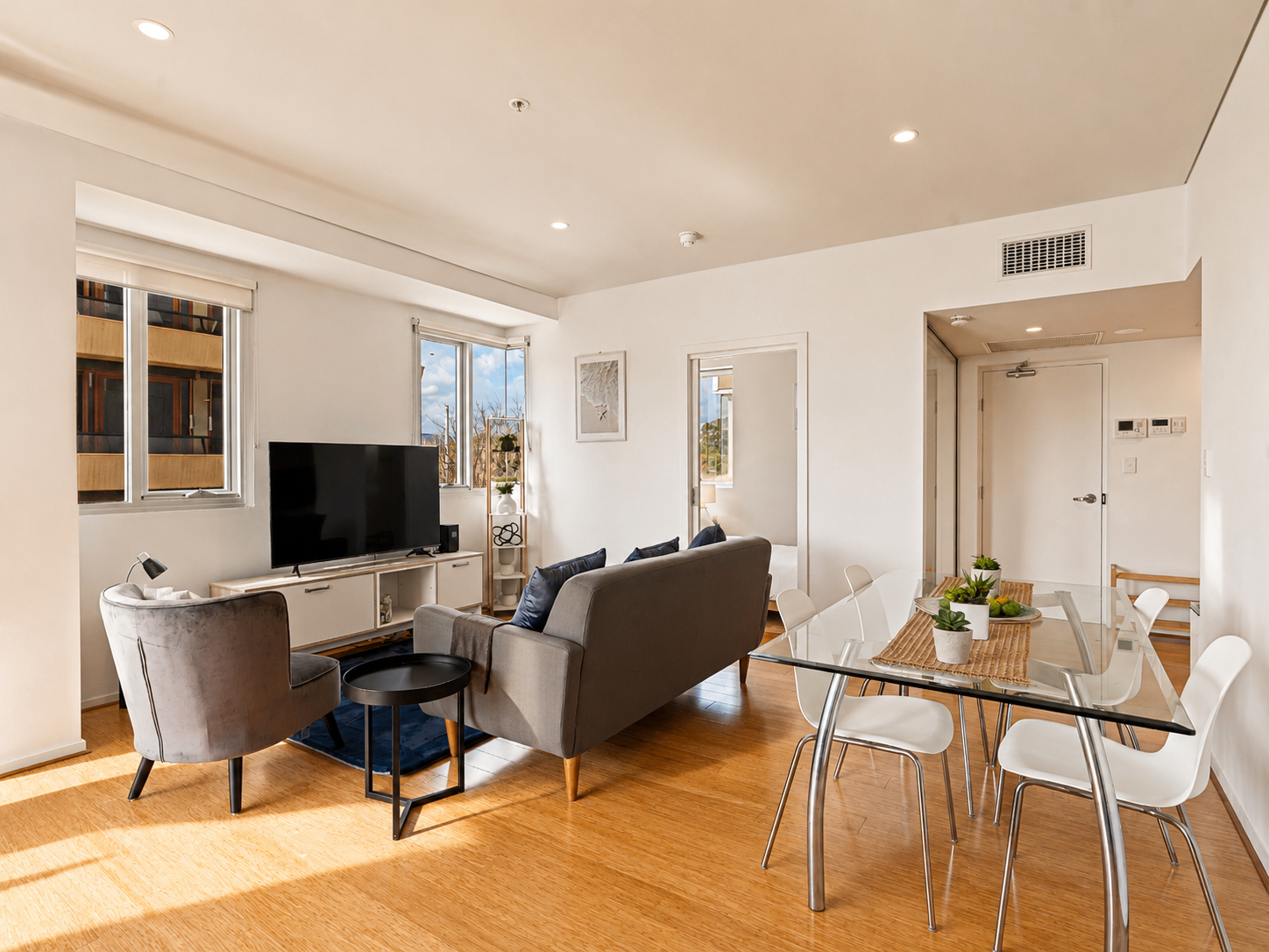 Renovated open-plan living area of Parkland Vista Luxury Retreat, a professionally managed short-stay rental in Adelaide CBD, Adelaide