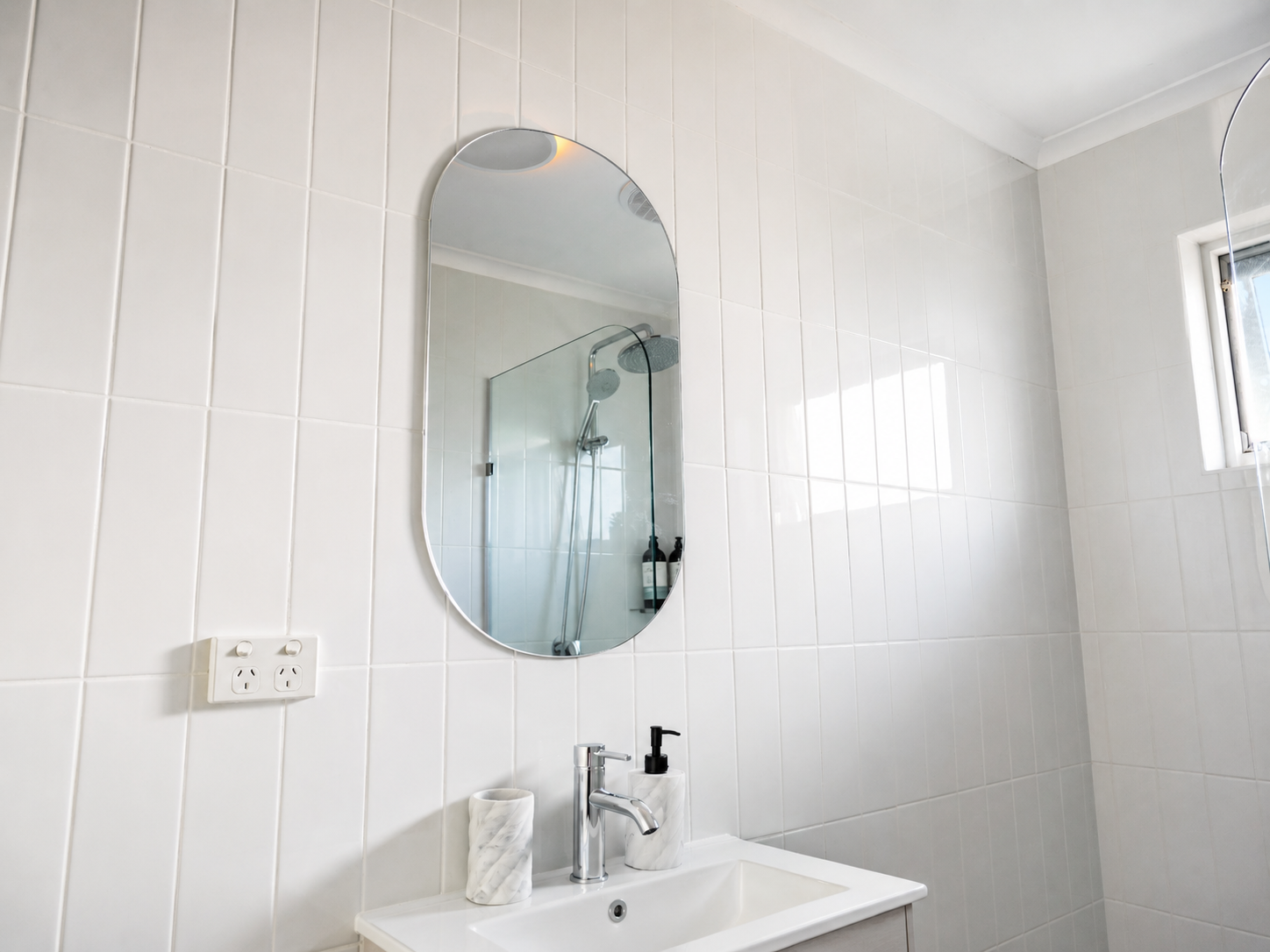 Renovated bathroom in Getaway at Glenelg, a Luxe-managed holiday home in Glenelg, Adelaide